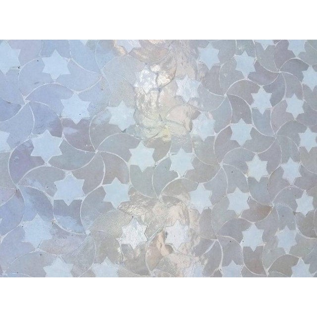 Custom made glazed Moroccan mosaic table measuring 48" in diameter. An indoor / outdoor dining table that sits up to six...