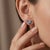 Enhance your jewellery collection with these charming leaf-inspired stud earrings featuring a graceful dual marquise...