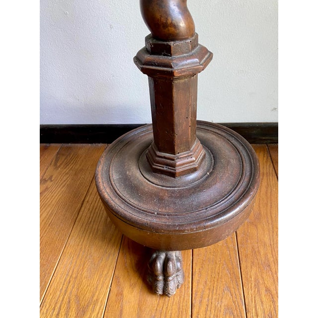 This is an original antique solid wood music stand. This piece can be used as a pedestal or for a conductor. This item is...