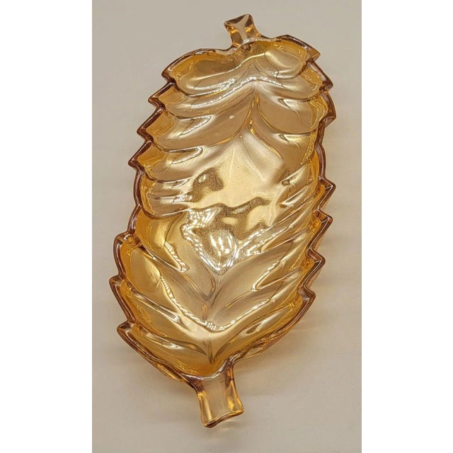 Indiana Glass Amber Carnival Glass Leaf Snack Dish 11" x 4.5" Vintage 1950s-1970 This carnival glass leaf-shaped dish was...