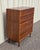 This is a vintage Lane Acclaim 5 drawer tallboy. It features dovetailed inlany on the edges of the drawers. This dresser...