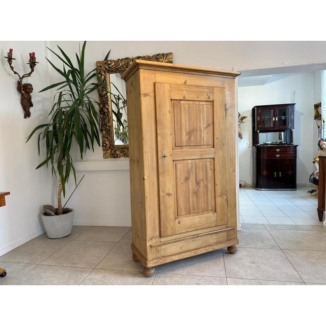 Restored antique farmhouse cupboard, natural wood, from the Biedermeier period. Dimensions: Height x Width x Depth 180 x...