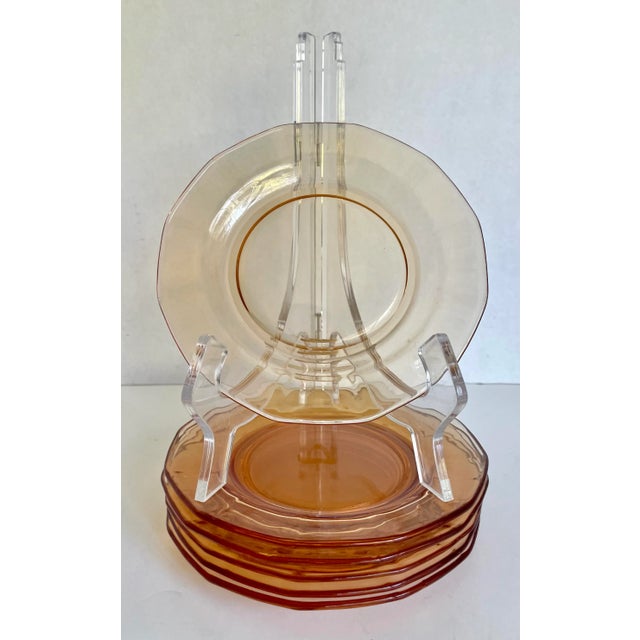 Here is a beautiful set of SIX depression era glass plates in peach colored glass. I just love the color of these! They're...