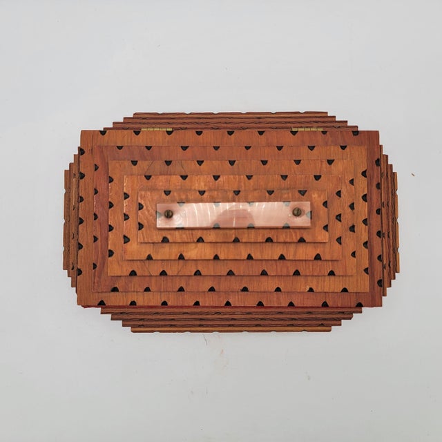 This box is an excellent example of Tramp Art, a folk art style that emerged in the late 19th and early 20th centuries,...