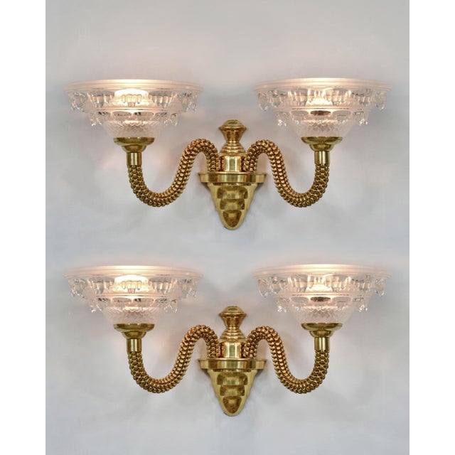 Jean Boris Lacroix A beautiful pair of French art deco double wall sconces around 1935-1940 in solid brass or bronze and...