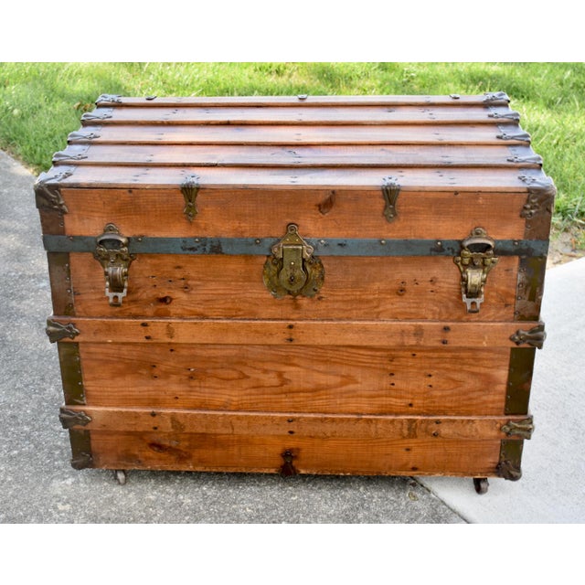 Antique - Late 19th Century Steamer Trunk. Made of Wood. Pine with Metal Details. The trunk has an Edwardian Style. The...
