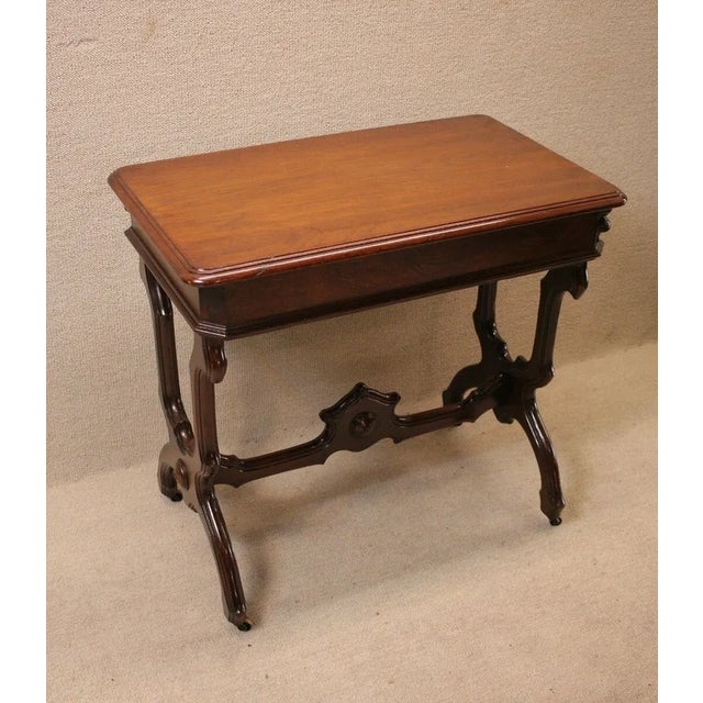 This antique walnut hallway/sofa table is in excellent condition with a few minor blemishes. With a small drawer and metal...