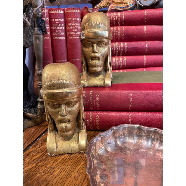 Gorgeous pair of antique carved, plastered and gilded wooden heads. They look like they were from a doorway or mantle...