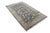 This hand-knotted rectangular area rug features an intricate, all-over botanical layout woven from a fine blend of wool...