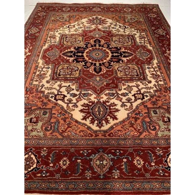 Serapi design rug. Handmade and hand-knotted in fine lambswool on a cotton foundation. Vegetable dyed hand-spun wool rug....