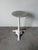 An elegant 19th-century French bistro table featuring a beautifully veined white marble top supported by an ornate cast-...