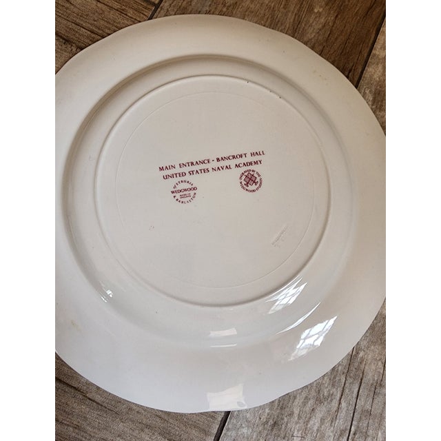 Collection of four United States Navy Wedgwood mulberry color transferware plates. Bancroft Hall, Tecumseh, alumni house,...