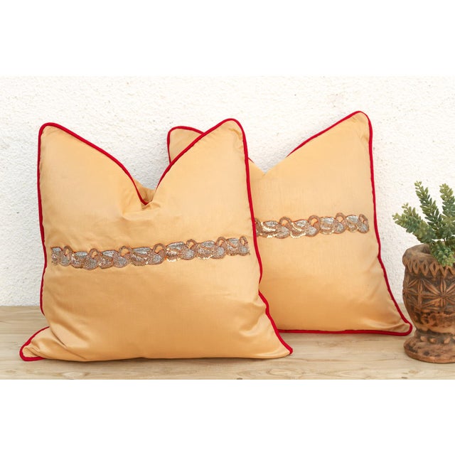Crafted in India from a lustrous silk-blend textile, this pillow cover is embellished by hand with traditional Zardozi-...