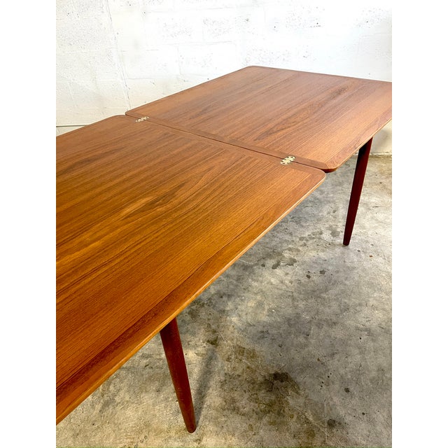 Kurt Ostervig Dining Folding Table. 39-78 Long 39.5d 29h. Easy to slide back and forth lengths.