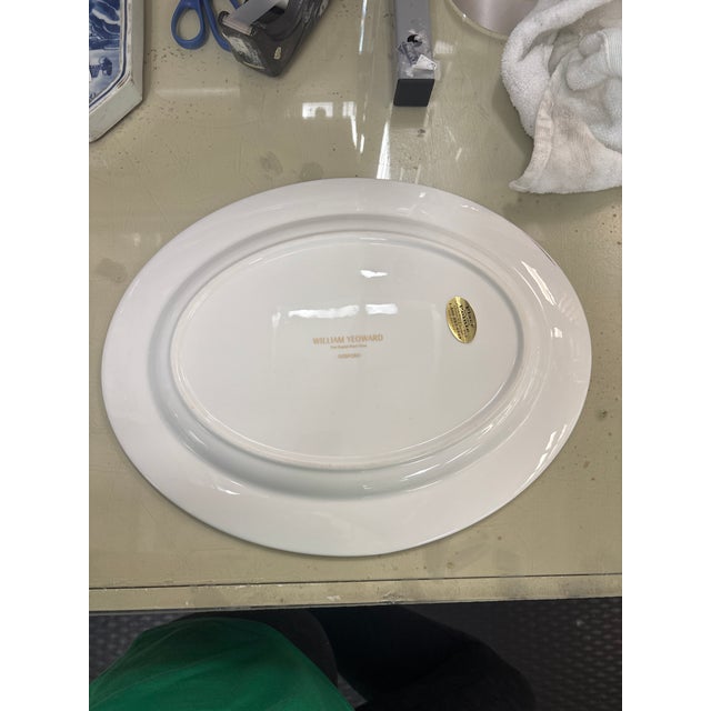 William Yeoward's Gosford is a lively, ornate pattern highlighted with burnished gold—a modern yet classic choice. It's...