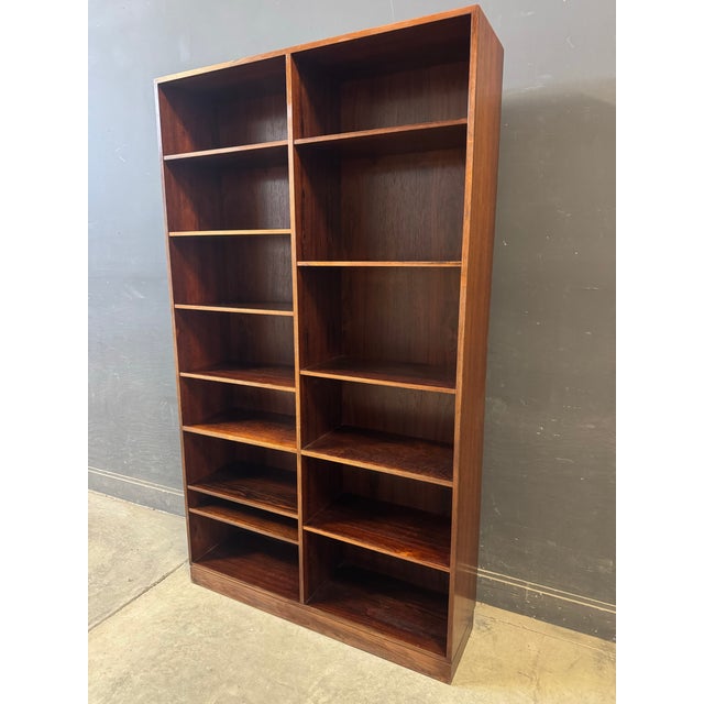 Danish Mid-Century Modern Carlo Jensen Rosewood Bookcase Shelf. Tall rosewood bookcase with attractive wood grain and 12...