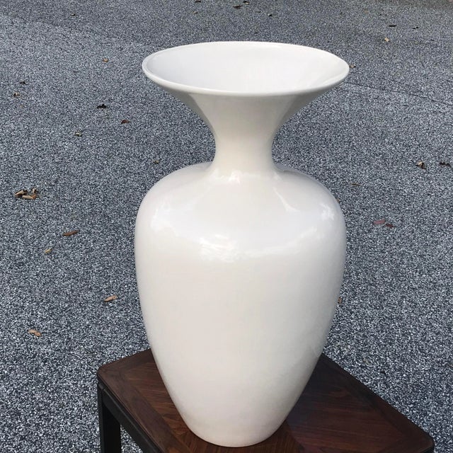 A fantastic artisan made sculptural ceramic vase fired in a white glaze finish by the California pottery company Jaru.