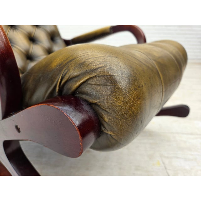 1950s, Chesterfield rocking chair. Original green furniture leather, teak wood. Original good condition: no smells, no...