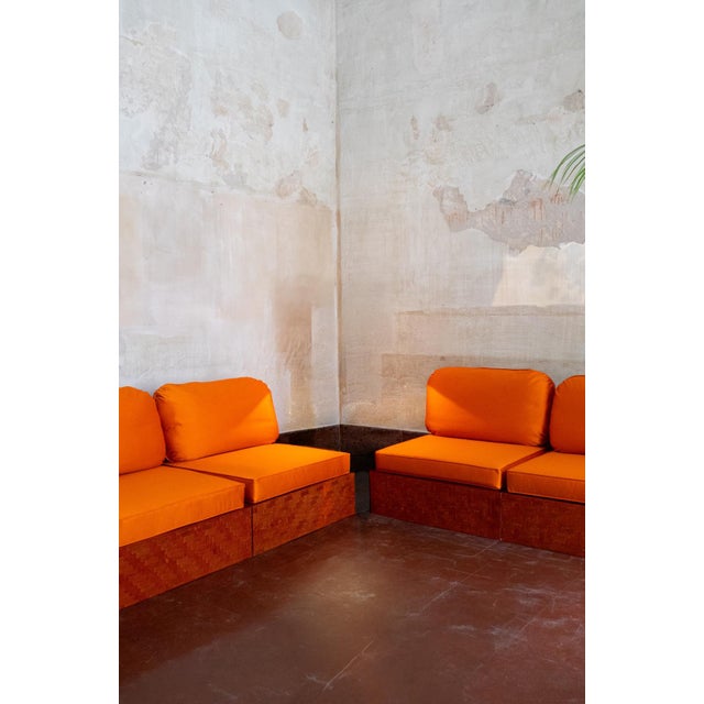 Modular sofa dating from the 1980s, composed of four independent modules with frames clad in pressed bamboo. The sofa has...