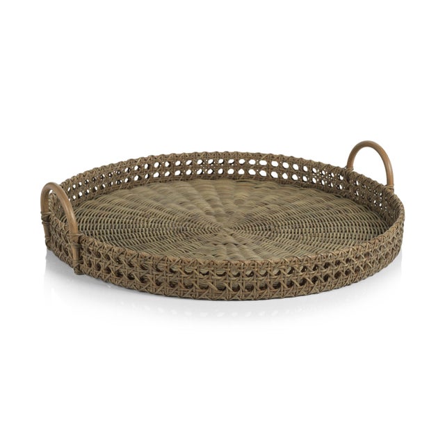 Bring a coastal style into your home with our circular shaped open weave rattan tray with handles for easy portability....