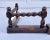 Here is a beautifully hand-crafted piece from the 1800's that features turned wood details and an adjustable size. That's...