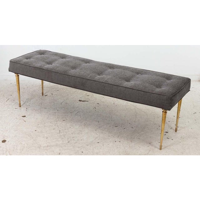 Italian Long Bench With Solid Brass Legs. Newly upholstered in Chenille with buttons and welting. Legs are cast and hand...