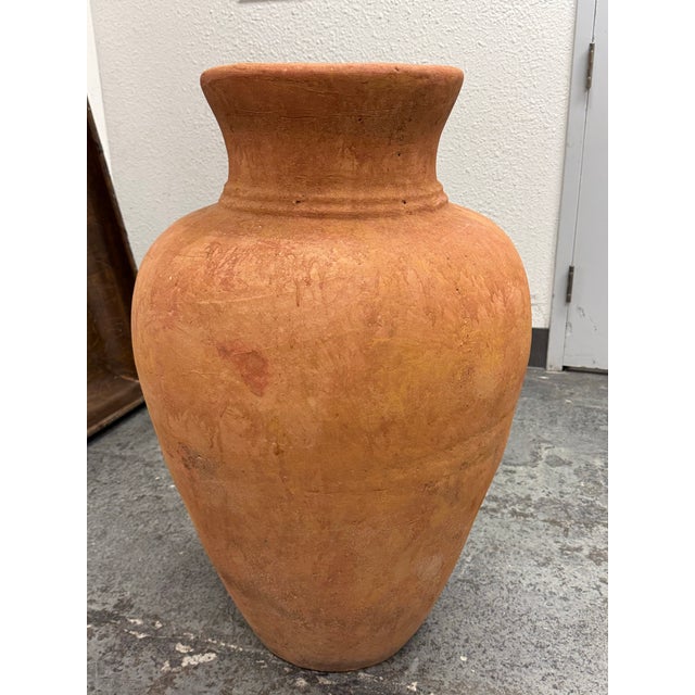 Design Plus Gallery presents an Italian Terracotta Outdoor Pot. This vessel has a classic amphora inspired profile with a...