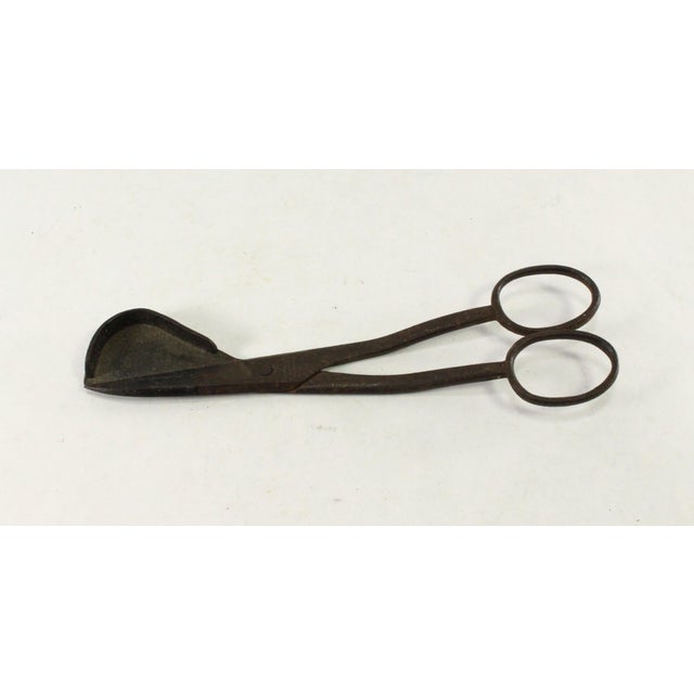 A very interesting and RARE early household tool A candle wick trimmer, designed to cut out the burning wick for cleaner...
