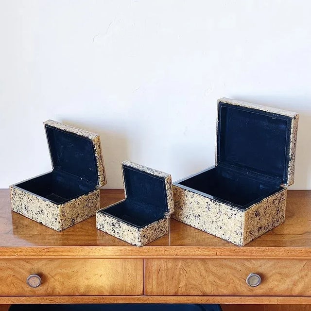 Vintage Nesting Boxes of Acrylic Resin with infused Grains and Black Velvet Lining, a Set of Three (3) Largest measures:...