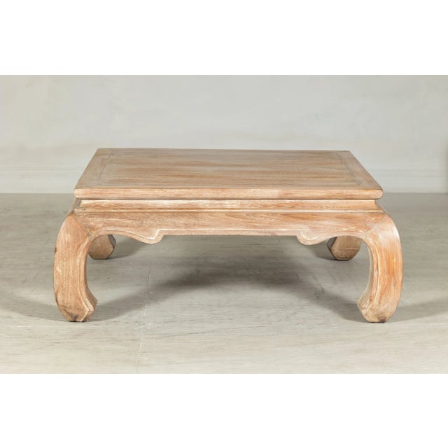 This vintage square coffee table showcases the timeless elegance of Asian design with its distinctive chow legs and...
