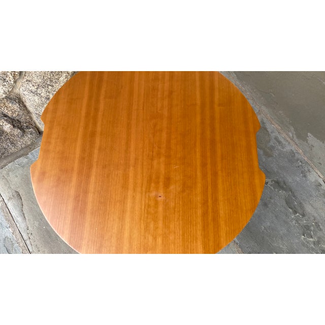 This Cassina Wood and Metal Side Table is an stylish addition to any living space. A combination of solid wood and coated...