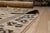 Willow Lydia Gold Hand Knotted Wool Rug, Country of Origin: China. This exquisite piece presents a refined transitional...