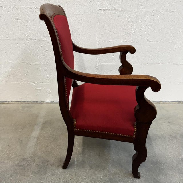 Authentic Louis-Philippe period office chair (mid-19th century) in solid walnut. Made in France. This chair perfectly...