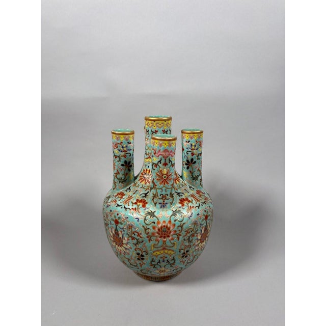 Famille rose porcelain vase on a turquoise ground, Republic period (1912-1949) , China, 20th century. The globular body,...