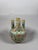 Famille rose porcelain vase on a turquoise ground, Republic period (1912-1949) , China, 20th century. The globular body,...