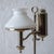 A nickel plated electrified student lamp by Stobwasser, Berlin, circa 1880. 10 ¼ inches wide by 6 ½ inches deep by 21 ¼...