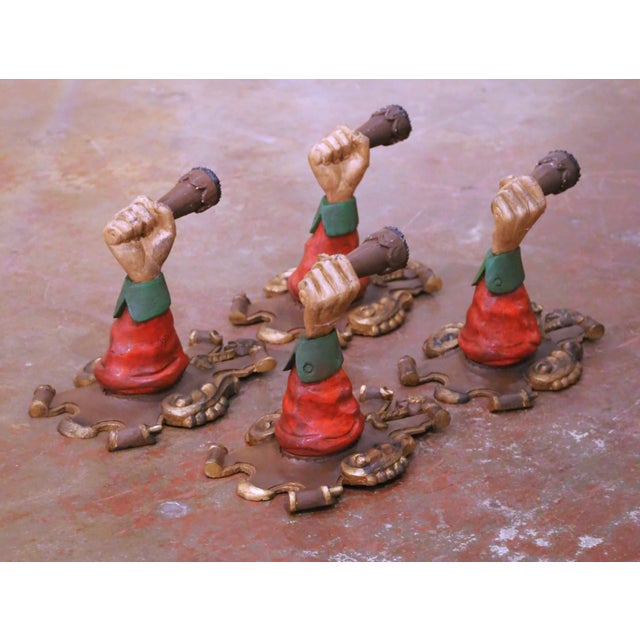 Decorate a wall with this whimsical set of four Italian carved candle sconces, crafted circa 1980. Each wall-mounted piece...