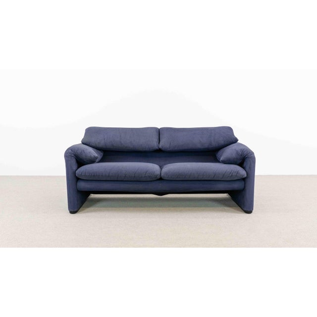 Vintage Maralunga 2-seater sofa by Cassina, designed in 1973 by Vico Magistretti. Width: 165cm. This sofa features...