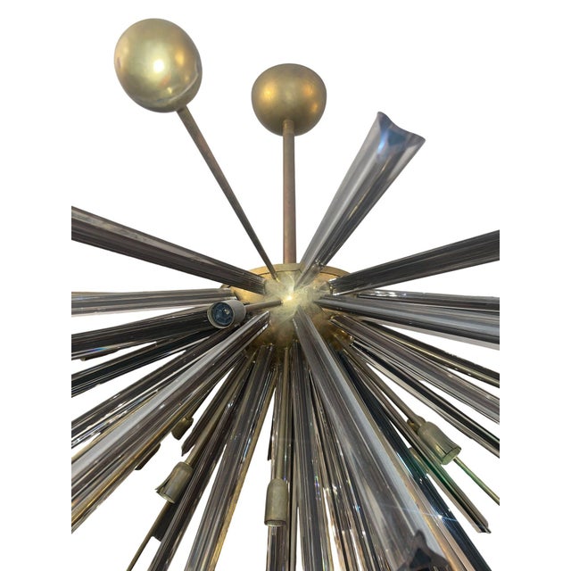Striking vintage Italian Murano glass Sputnik semi-flush mount chandelier dating to the 1980's, featuring a dramatic...