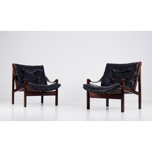 Great safari chair, model Hunter designed by Torbjørn Afdal, produced by Bruksbo. Original black leather cushions and...