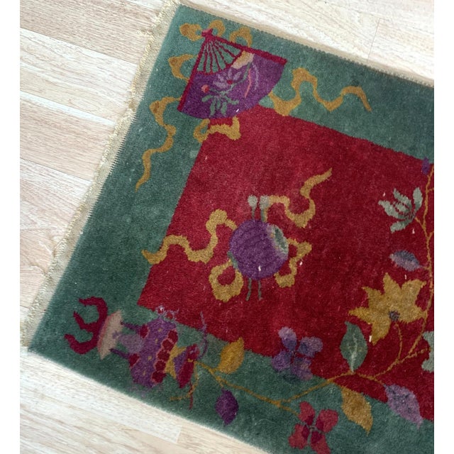 This exquisite Art Deco Chinese rug from the 1920s is a true work of art. Handmade with meticulous attention to detail, it...