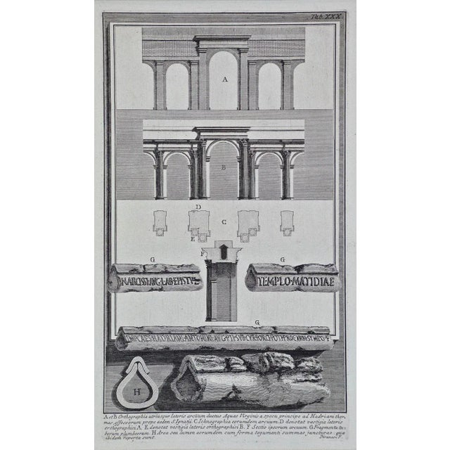 This is a framed Giovanni Battista Piranesi (1720-1778) etching entitled "Orthographia utriusque lateris arcuum ductus...