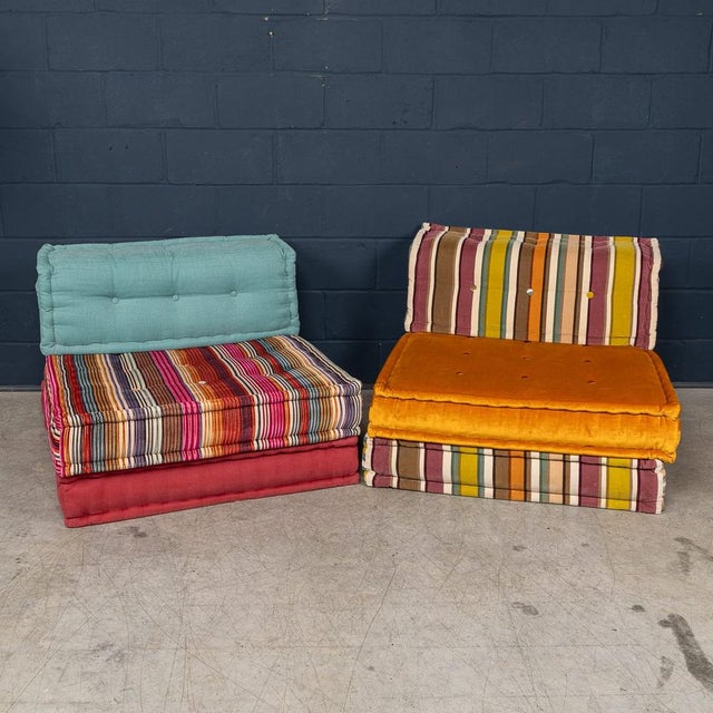 Elevate a living space with this stunning designer “Mah Jong” modular sofa suite by Roche Bobois. The set consists of four...