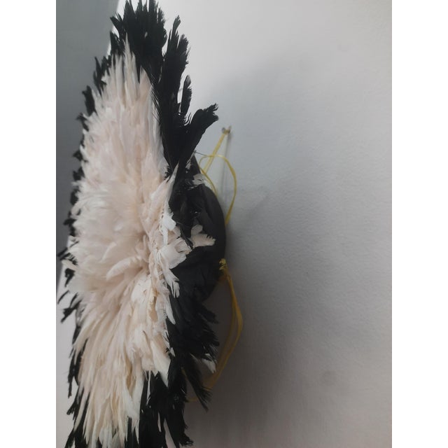 Juju hat white outline black of 27" (70 cm). Juju hat made with natural feathers and rattan. Juju hat woven and...