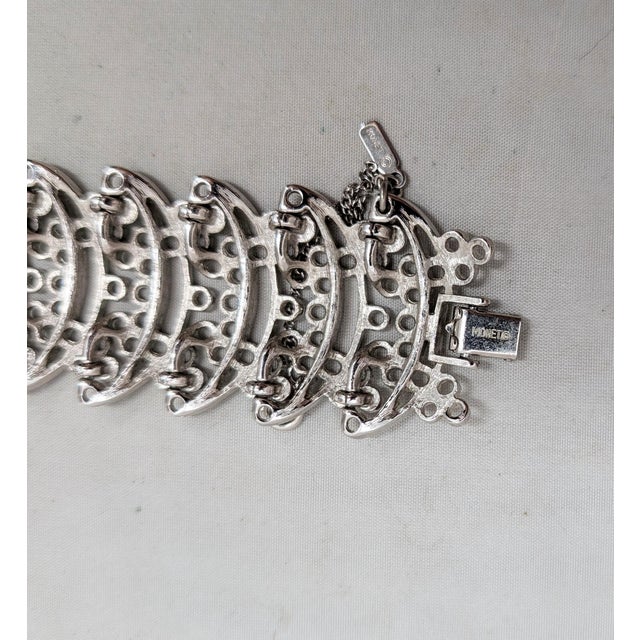 Silver Vintage 1973 Signed Monet Rhodium Plated Openwork Link Primavera Bracelet For Sale - Image 8 of 8
