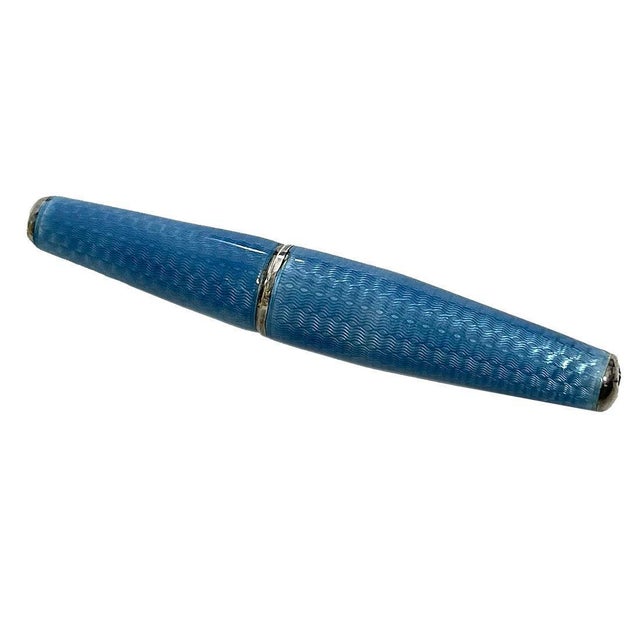 Art Deco German silver enamel and guilloche cigarette holder, 1910 This Art Deco cigarette holder, made of silver, is...
