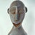 A hand-carved Lega figure originates from the Lega people in the Democratic Republic of the Congo. The figure is easily...
