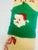 This is a knitted Christmas stocking , handmade. Appearance • Knit in traditional holiday colors: red, green, and cream •...