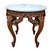 On offer is a luxuriantly carved Rococo Revival style, marble-topped occasional table. This piece is a prime example of...