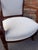 There are a lovely pair of French Restoration Charles X armchairs newly upholstered in classic antique white fabric. They...